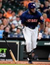Houston Astros designated hitter Yordan Alvarez watches his two-run double during the first inning of a baseball game against the Seattle Mariners, Sunday, June 30, 2019, in Houston. (AP Photo/Eric Christian Smith)