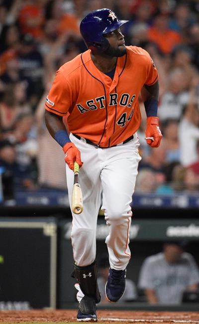 Houston Astros' Yordan Alvarez watches his solo home run off Seattle Mariners starting pitcher Yusei Kikuchi during the second inning of a baseball game Friday, Aug. 2, 2019, in Houston. (AP Photo/Eric Christian Smith)