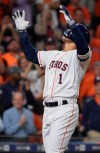 Houston Astros' Carlos Correa celebrates his solo home run off Oakland Athletics starting pitcher Frankie Montas during the fourth inning of a baseball game, Friday, April 5, 2019, in Houston. (AP Photo/Eric Christian Smith)