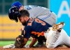 Houston Astros' Jack Mayfield (9) slides safely into second for a double, beating the tag of Toronto Blue Jays second baseman Eric Sogard during the sixth inning of a baseball game, Saturday, June 15, 2019, in Houston. (AP Photo/Eric Christian Smith)