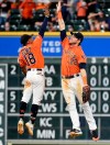 Houston Astros' Tony Kemp (18) and Josh Reddick celebrate their win over the Toronto Blue Jays in a baseball game, Friday, June 14, 2019, in Houston. (AP Photo/Eric Christian Smith)