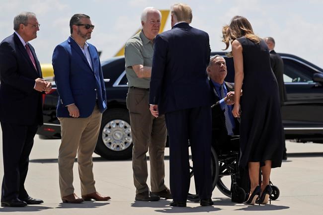 President Donald Trump greets Sen. John Cornyn, R-Texas, as Sen. Ted Cruz, R-Texas, second from left, and El Paso Mayor Dee Margo, watch, as first lady Melania Trump greets Texas Gov. Greg Abbott, as they arrive at El Paso International Airport to meet with people affected by the El Paso mass shooting, Wednesday, Aug. 7, 2019, in El Paso, Texas. (AP Photo/Evan Vucci)