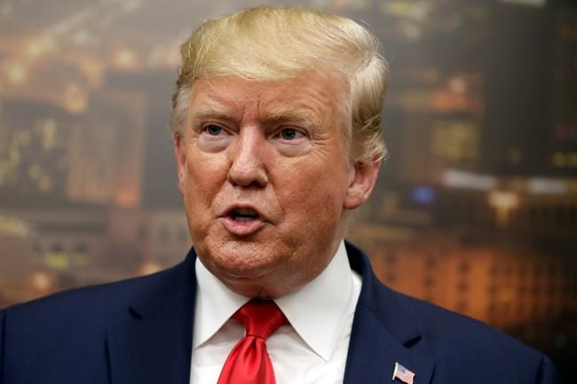 President Donald Trump speaks to the media as he visits the El Paso Regional Communications Center after meeting with people affected by the El Paso mass shooting, Wednesday, Aug. 7, 2019, in El Paso, Texas. (AP Photo/Evan Vucci)