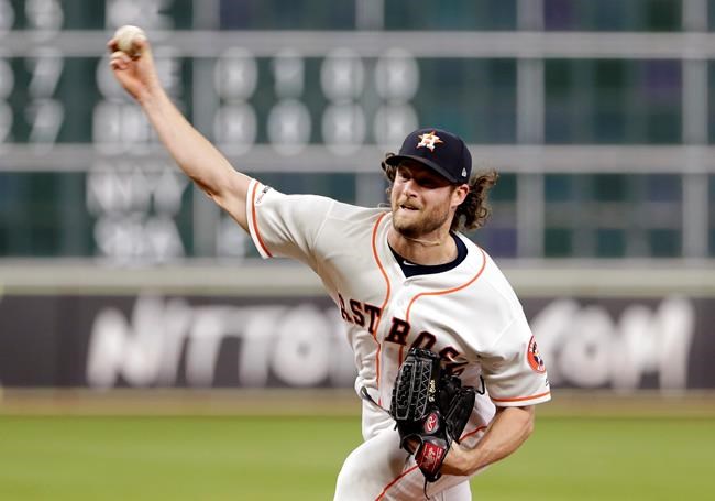 Houston Astros starting pitcher Gerrit Cole throws against the Tampa Bay Rays during the first inning of a baseball game Wednesday, Aug. 28, 2019, in Houston. (AP Photo/Michael Wyke)