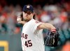 Houston Astros starting pitcher Gerrit Cole (45) throws during the first inning of a baseball game against the Colorado Rockies Wednesday, August 7, 2019, in Houston. (AP Photo/Michael Wyke)