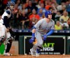 Kansas City Royals' Ryan O'Hearn (66) watches his grand slam in front of Houston Astros catcher Robinson Chirinos during the third inning of a baseball game Tuesday, May 7, 2019, in Houston. (AP Photo/Michael Wyke)