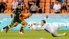 Portland Timbers defender Julio Cascante, left, and Houston Dynamo forward Mauro Manotas, middle, watch as Timbers goalkeeper Jeff Attinella, right, catches the goal shot by Manotas during the second half of an MLS soccer match Wednesday, May 15, 2019, in Houston. (AP Photo/Michael Wyke)