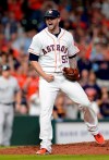 Houston Astros relief pitcher Ryan Pressly (55) reacts after striking out New York Yankees catcher Gary Sanchez to end the eighth inning of a baseball game after the New York Yankees scored four runs, Wednesday, April 10, 2019, in Houston. (AP Photo/Michael Wyke)
