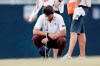 Lanto Griffin cries as he squats and rests his head on his putter after winning the Houston Open golf tournament Sunday, Oct, 13, 2019, in Houston. (AP Photo/Michael Wyke)