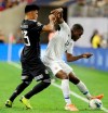 Mexico midfielder Jesus Gallardo (23) pushes Costa Rica forward Joel Campbell (12) who tries to keep the ball inbounds during the first half of a CONCACAF Gold Cup quarterfinal soccer match Saturday, June 29, 2019, in Houston. (AP Photo/Michael Wyke)