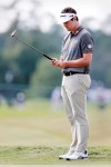Beau Hossler checks the lie of his ball on the 8th green before hitting during the third round of the Houston Open golf tournament Saturday, Oct, 12, 2019, in Houston. (AP Photo/Michael Wyke)