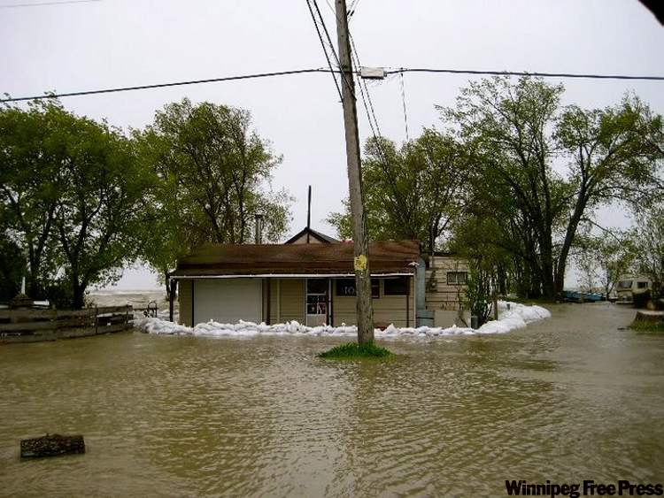 Sam Classen / Submitted photo
Water from Lake Manitoba overwhelms a Twin Lakes Beach property in the RM of St. Laurent.