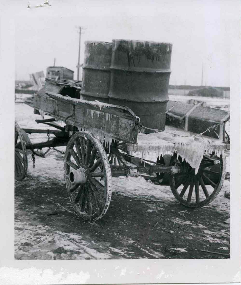 University of Manitoba Archives & Special Collections, Winnipeg Tribune fonds
December 20, 1951: A conveyance sometimes used to haul water to another Rooster Town family. The closest source of water for them is a standpipe on Cambridge Street about 1.2 kilometres away. Residents either paid a trucker 80 cents a barrel for water, or they fetched it themselves.