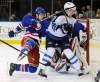 Bill Kostroun / the associated press
New York Rangers' Michael Del Zotto loses his balance as he is checked by Winnipeg Jets' Antti Miettinen during the first period of an NHL game at Madison Square Garden in New York on Monday. The Rangers won 4-2.
