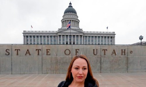 In this Feb. 27, 2019, photo, Michelle Aldana is shown at the Utah State Capitol in Salt Lake City. Utah is one of at least four states considering bans this year on the shackling of incarcerated women during childbirth. The Utah measure has passed the state House and is being considered by the Senate. The measure is a relief for mothers like Aldana, who was shackled when she gave birth while incarcerated on a drug charge in 2001. (AP Photo/Rick Bowmer)