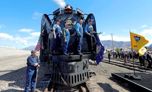 The crew from the Living Legend, No. 844 pose for a photograph during the commemoration of the 150th anniversary of the Transcontinental Railroad completion at Union Station Thursday, May 9, 2019, in Ogden, Utah. (AP Photo/Rick Bowmer)