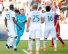 Portland Timbers goalkeeper Steve Clark (12) celebrates after saving a penalty kick off Real Salt Lake midfielder Albert Rusnak (11) in the first half of an MLS soccer match Saturday, May 4, 2019, at Rio Tinto Stadium in Sandy, Utah. (Leah Hogsten/The Salt Lake Tribune via AP)