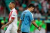 Uruguay's Luis Suarez, right, walks by Peru's Paolo Guerrero, left, after failing to score during the penalty shoot-out during a Copa America quarterfinal soccer match at the Arena Fonte Nova in Salvador, Brazil, Saturday, June 29, 2019. (AP Photo/Ricardo Mazalan)