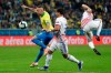 Brazil's Everton, left, vies for the ball with Paraguay's Juan Escobar, center, during a Copa America quarterfinal soccer match at the Arena do Gremio in Porto Alegre, Brazil, Thursday, June 27, 2019. (AP Photo/Andre Penner)