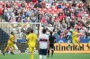 Vancouver Whitecaps' Fredy Montero, second right, gets his head on the ball in front of Columbus Crew's Connor Maloney, right, to score the tying goal in stoppage time during the second half of an MLS soccer game in Vancouver, on Saturday September 21, 2019. THE CANADIAN PRESS/Darryl Dyck