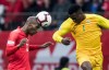 Canada's Atiba Hutchinson, left, gets his head on the ball in front of French Guiana's Soleymann Auguste during the second half of a CONCACAF Nations League qualifying soccer match in Vancouver, on Sunday March 24, 2019. THE CANADIAN PRESS/Darryl Dyck