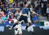 Los Angeles Galaxy's Zlatan Ibrahimovic, front, and Vancouver Whitecaps' Doneil Henry vie for the ball during the second half of an MLS soccer game in Vancouver, on Friday April 5, 2019. THE CANADIAN PRESS/Darryl Dyck