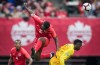 Canada's Doneil Henry, front left, and French Guiana's Jules Haabo, right, vie for the ball during the second half of a CONCACAF Nations League qualifying soccer match in Vancouver, on Sunday March 24, 2019. THE CANADIAN PRESS/Darryl Dyck