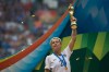 United States' Abby Wambach hoists the trophy after defeating Japan to win the FIFA Women's World Cup final soccer game in Vancouver, B.C., on Sunday July 5, 2015. THE CANADIAN PRESS/Darryl Dyck
