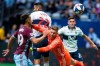 Colorado Rapids' Andre Shinyashiki (99) scores against Vancouver Whitecaps goalkeeper Zac MacMath (18) during the first half of an MLS soccer game in Vancouver on Saturday, June 22, 2019. THE CANADIAN PRESS/Ben Nelms