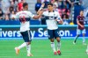 Vancouver Whitecaps' Fredy Montero (12) celebrates his goal against the Colorado Rapids with teammate Ali Adnan (53) during the first half of an MLS soccer game in Vancouver on Saturday, June 22, 2019. THE CANADIAN PRESS/Ben Nelms