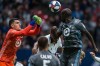 Minnesota United goalkeeper Vito Mannone (1) makes a save near teammate Ike Opara (3) during second half MLS soccer action against the Vancouver Whitecaps, in Vancouver on Saturday, March 2, 2019. THE CANADIAN PRESS/Ben Nelms