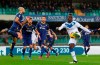 Brescia's Mario Balotelli, right, kicks the ball during the Italian Serie A soccer match between Verona and Brescia at the Bentegodi stadium in Verona, Italy, Sunday, Nov. 3, 2019. (Simone Venezia/ANSA via AP)