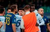 Brescia's Mario Balotelli, second from right, reacts to Verona supporters' racist chants during the Italian Serie A soccer match between Verona and Brescia at the Bentegodi stadium in Verona, Italy, Sunday, Nov. 3, 2019. (Simone Venezia/ANSA via AP)