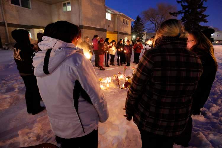 Vigil held at site where body found – Winnipeg Free Press