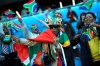 Fans for South Africa wave flags prior to the Women's World Cup Group B soccer match between Spain and South Africa at the Stade Oceane in Le Havre, France, Saturday, June 8, 2019. (AP Photo/Francisco Seco)
