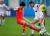 China's Wang Shanshan, left, vies for control of the ball against Spain's Leila Ouahabi during the Women's World Cup Group B soccer match between China and Spain at the Stade Oceane in Le Havre, France, Monday, June 17, 2019. (AP Photo/Francisco Seco)