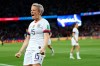 United States' Megan Rapinoe celebrates after scoring her side's second goal during the Women's World Cup quarterfinal soccer match between France and the United States at the Parc des Princes, in Paris, Friday, June 28, 2019. (AP Photo/Francisco Seco)