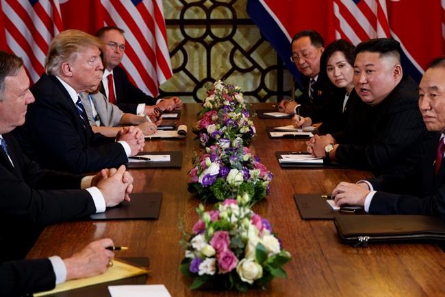 President Donald Trump speaks during a meeting with North Korean leader Kim Jong Un Thursday, Feb. 28, 2019, in Hanoi. At front right is Kim Yong Chol, a North Korean senior ruling party official and former intelligence chief. At left is Secretary of State Mike Pompeo, second from left. (AP Photo/ Evan Vucci)