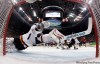 Julie Jacobson / The Associated Press
Germany goalie Thomas Greiss stretches to block a shot against Canada in the third period.