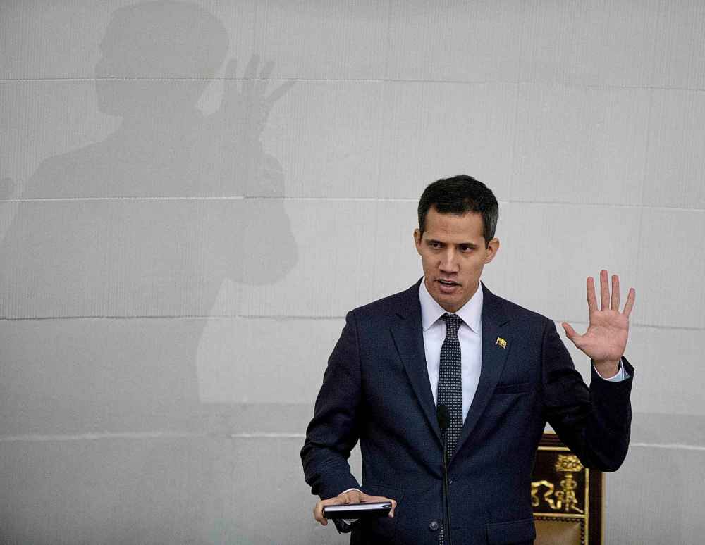 Fernando Llano / The Associated Press files
Venezuelan lawmaker Juan Guaido takes the oath of office as president of the National Assembly in Caracas, Venezuela.