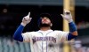 Seattle Mariners' Omar Narvaez motions as he crosses home on his solo home run against the Oakland Athletics in the second inning of a baseball game Sunday, July 7, 2019, in Seattle. (AP Photo/Elaine Thompson)