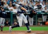 New York Yankees' Aaron Judge singles against the Seattle Mariners in the second inning of a baseball game, Monday, Aug. 26, 2019, in Seattle. (AP Photo/Elaine Thompson)