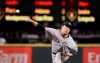 New York Yankees starting pitcher Masahiro Tanaka throws to a Seattle Mariners batter during the fourth inning of a baseball game Tuesday, Aug. 27, 2019, in Seattle. (AP Photo/Elaine Thompson)
