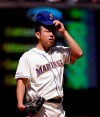 Seattle Mariners starting pitcher Yusei Kikuchi pauses after giving up a run to the Los Angeles Angels in the fourth inning of a baseball game Sunday, July 21, 2019, in Seattle. (AP Photo/Elaine Thompson)