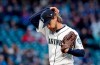 Seattle Mariners starting pitcher Mike Leake walks off the field at the end of the top of the fifth inning of a baseball game against the Texas Rangers, Saturday, April 27, 2019, in Seattle. (AP Photo/Elaine Thompson)
