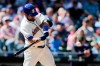 Seattle Mariners' Edwin Encarnacion swings for a three-run home run on a pitch from Minnesota Twins' Trevor May during the seventh inning of a baseball game, Sunday, May 19, 2019, in Seattle. (AP Photo/John Froschauer)