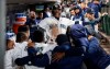 Seattle Mariners' Shed Long is congratulated by teammates in the dugout after hitting a solo home run off Chicago White Sox starting pitcher Dylan Cease during the fifth inning of a baseball game Saturday, Sept. 14, 2019, in Seattle. (AP Photo/Stephen Brashear)