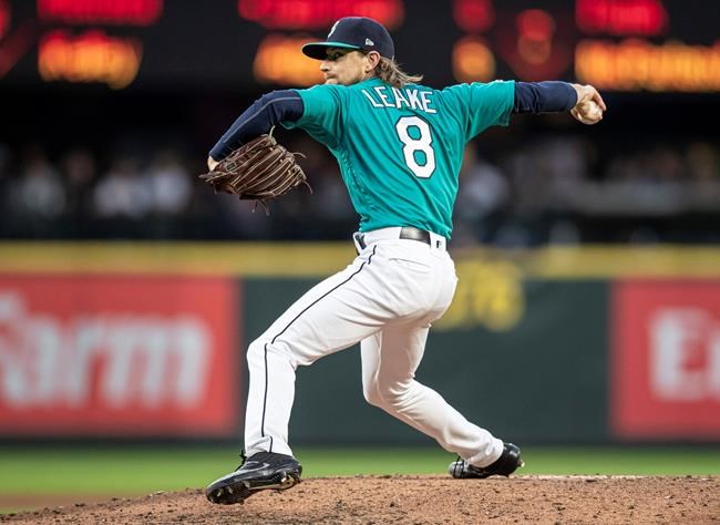 Seattle Mariners starter Mike Leake delivers a pitch during the fifth inning of the team's baseball game against the Baltimore Orioles, Friday, June 21, 2019, in Seattle. The Mariners won 10-9. (AP Photo/Stephen Brashear)