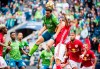 Seattle Sounders defender Gustav Svensson (4) goes up for header against New York Red Bulls midfielder Sean Davis (27) on Sunday, Sept. 15, 2019, in the first half of a MLS soccer match at CenturyLink Field in Seattle, Wash. (Joshua Bessex/The News Tribune via AP)