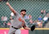 Baltimore Orioles starting pitcher Dylan Bundy throws to a Seattle Mariners batter during the first inning of a baseball game Thursday, June 20, 2019, in Seattle. (AP Photo/Ted S. Warren)